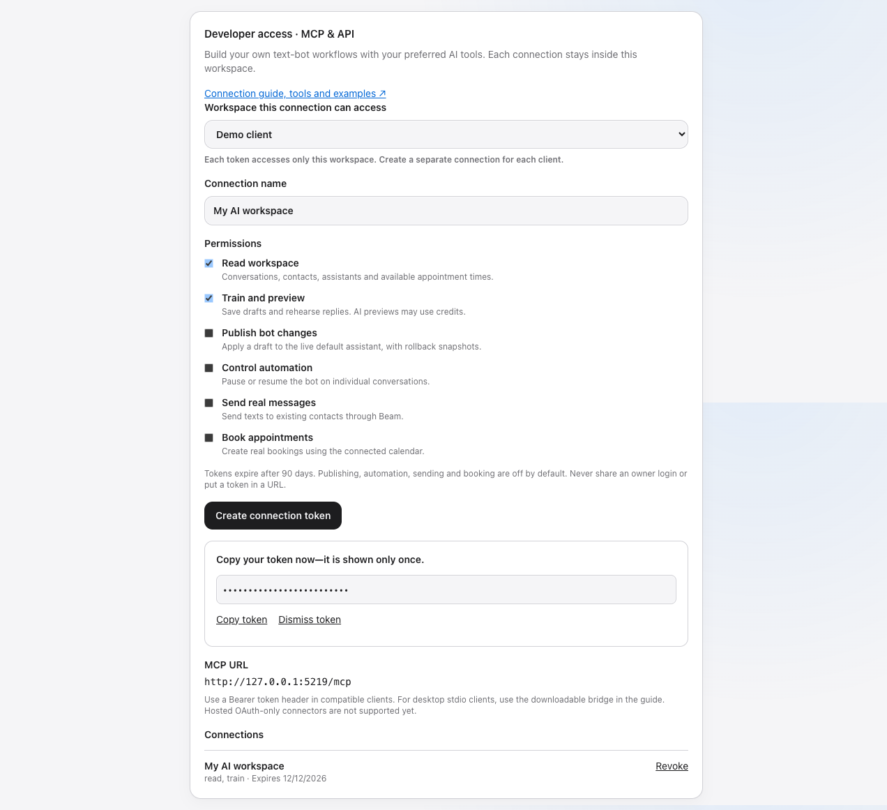 Demo client selected with a masked connection token, Copy token and Revoke controls